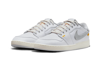 Kup oryginalne Air Jordan 1 Retro AJKO Low SP Union Neutral Grey DO8912-101 - widok z drugiego boku - Sneakersy
