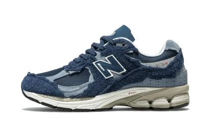 New Balance 2002R Protection Pack Navy granatowy-szary - widok główny z boku | Saturaise.com