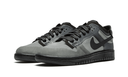 Kup oryginalne Dunk Low Comme des Garçons Black CZ2675-002 - widok z drugiego boku - Sneakersy