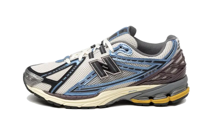 New Balance 1906R Metallic Blue niebieski-brązowy - widok główny z boku | Saturaise.com