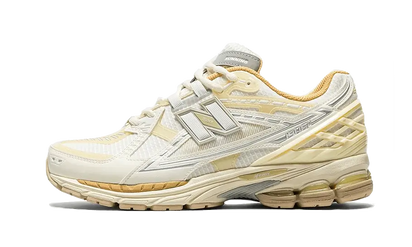 New Balance 1906U Lunar New Year Cream biały-brązowy - widok główny z boku | Saturaise.com