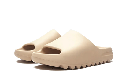 Kup oryginalne Yeezy Slide Pure (Restock Pair) - widok z drugiego boku - Sneakersy
