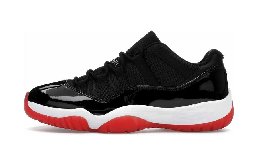 Air Jordan Air Jordan 11 Retro Low Bred (2025) czarno-czerwony - widok główny z boku | Saturaise.com