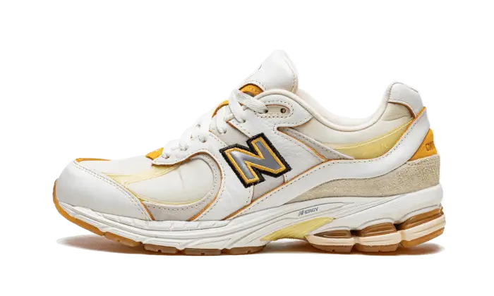 New Balance 2002R Joe Freshgoods Conversations Amongst Us szary-brązowy - widok główny z boku | Saturaise.com